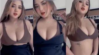 Goyangan Seksi Xixi dengan Gaun Hitam yang Menggoda